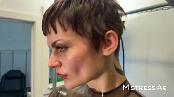 Solo 2 showcasing translucent latex outfit and hankey’s toys strap on