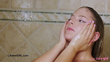 Aluuring teen blonde took a shower