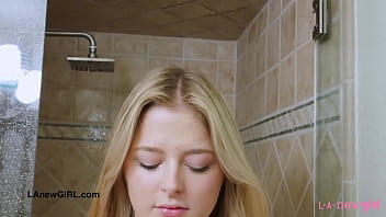 Aluuring teen blonde took a shower