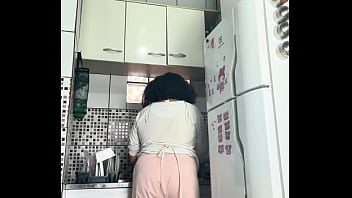Chubby housewife farting while washing dishes voyeur style Chubby housewife farting while washing dishes voyeur style