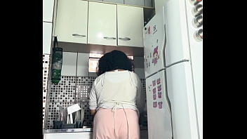 Chubby housewife farting while washing dishes voyeur style