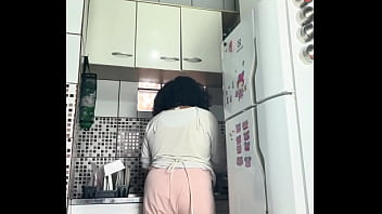Chubby housewife farting while washing dishes voyeur style
