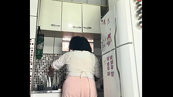 Chubby housewife farting while washing dishes voyeur style
