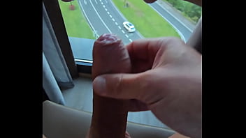 Precum Wank At The Hotel Window thumbnail