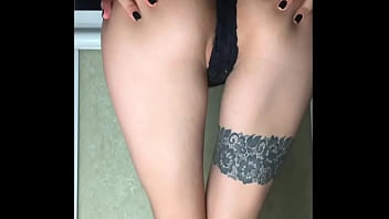 Girl sensual masturbate pussy dildo and leans out of the window