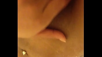 Young whore plays with her cunt in the shower