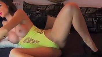 Euro brunetee has nips peeking out her bra