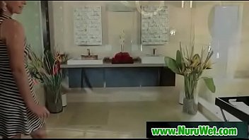 Busty asian sucking clients cock in nuru massage 13