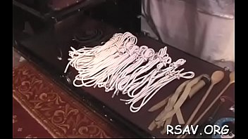 Fastened wench gets spanked hard