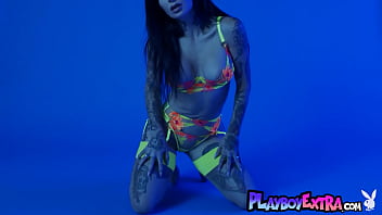 Big titted beauty introducing her sexy tattoos and her hot pussy