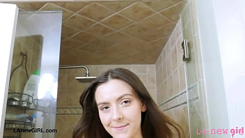 Pretty and sexy brunette model enjoys a sensual bath