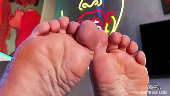 Wiggling toes on the table in front of your face Wiggling toes on the table in front of your face