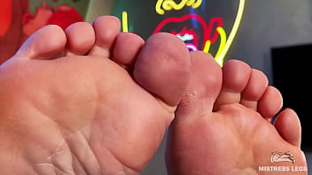 Wiggling toes on the table in front of your face Wiggling toes on the table in front of your face