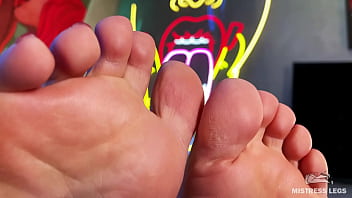 Wiggling toes on the table in front of your face Wiggling toes on the table in front of your face