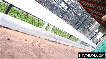 American milf masturbates outdoors in the neighborhood