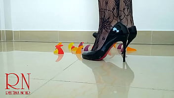 Sweet jeles destroying with high heels shoes on the floor c1