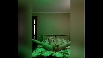 Brunette pleasures her pussy with a rubber cock