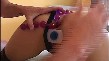 Horny blonde putting toy in her both holes