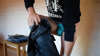 Trying on tight jeans