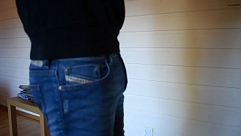 Trying on tight jeans