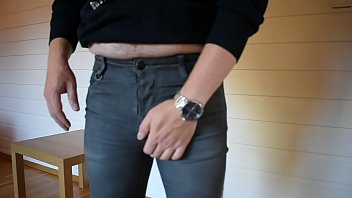 Trying on tight jeans