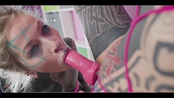 Tattooed babe goes hard with the strap until the inked slut squirts