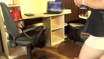 Pretty woman at work in a miniskirt