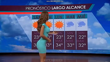 Sexy news anchor with sexy figure on live tv channel