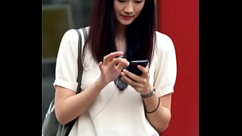 Attractive chinese looking woman got upskirt by the wind Attractive chinese looking woman got upskirt by the wind