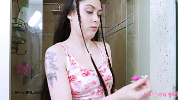 Elegant brunette beauty enjoys a sensual bath