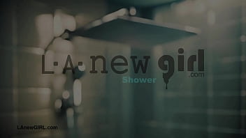 Elegant brunette beauty enjoys a sensual bath