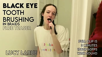 Black eye tooth brushing in braids