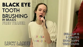 Black eye tooth brushing in braids