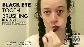 Black eye tooth brushing in braids
