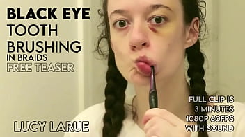Black eye tooth brushing in braids