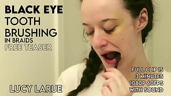 Black eye tooth brushing in braids