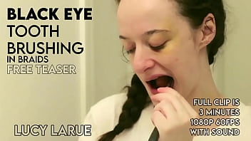 Black eye tooth brushing in braids