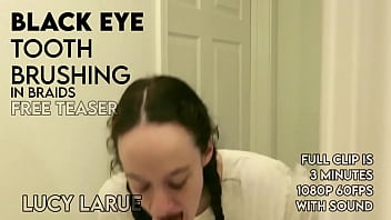 Black eye tooth brushing in braids
