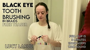 Black eye tooth brushing in braids