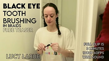 Black eye tooth brushing in braids