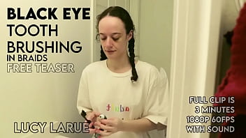 Black eye tooth brushing in braids