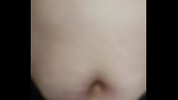 Milf enjoys a finger in the navel