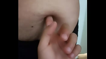 Milf enjoys a finger in the navel