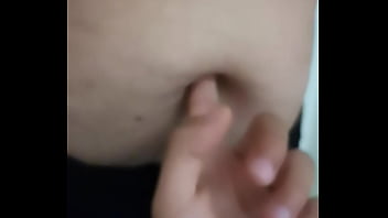 Milf enjoys a finger in the navel