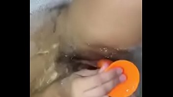 Lok pussy play toys in the tub