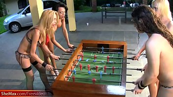 T Girls Strip Down Lingerie And Stockings Playing Foosball thumbnail