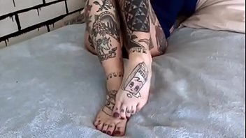 Tattooed cam girl feet