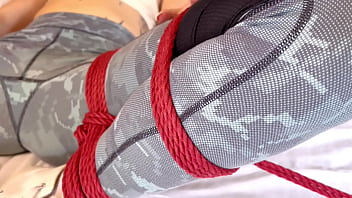 Using a magic wang while dressed in leggings