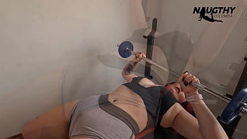 Redhead milf gets aroused while working out