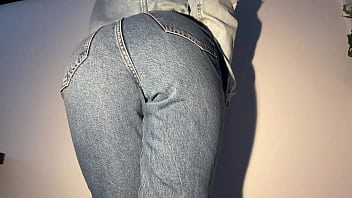Girl desperately peeing her jeans